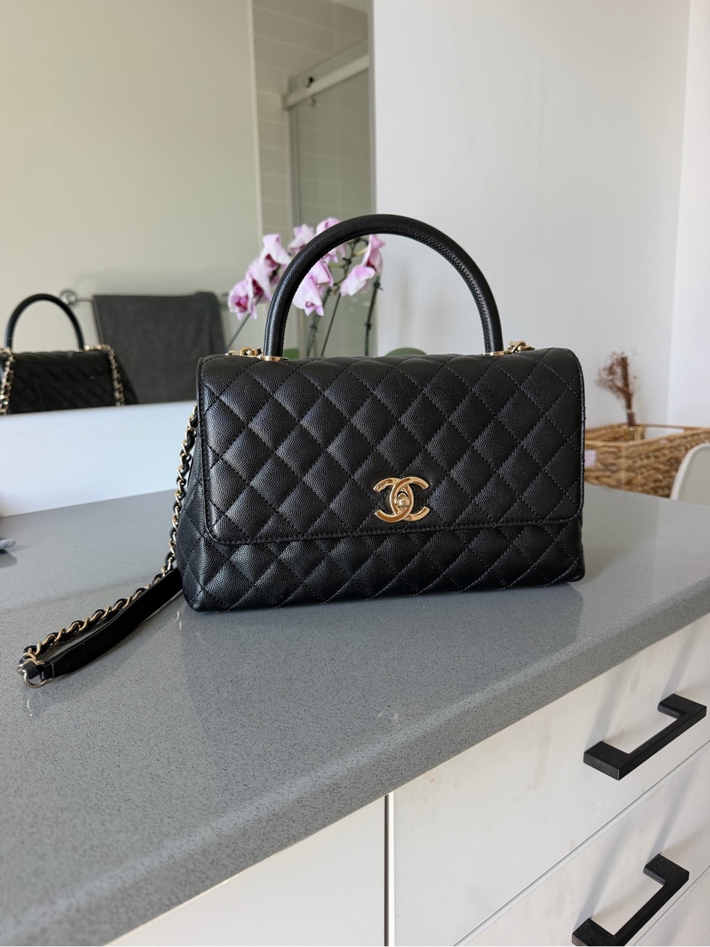 CHANEL Black Quilted Top-Handle Satchel with Gold CC Hardware and Chain Strap
